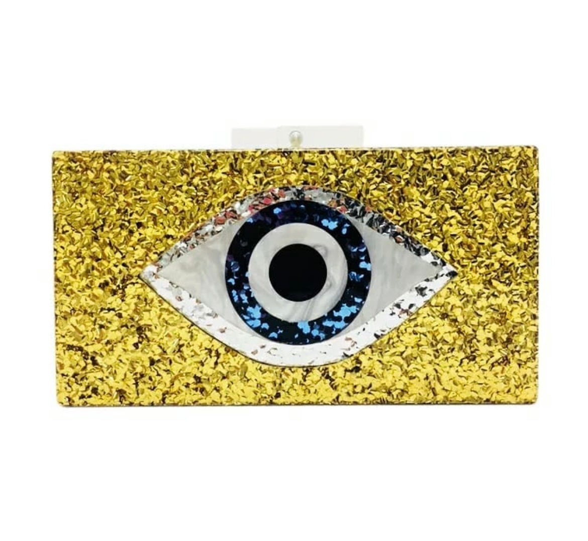 Gold eye clutch