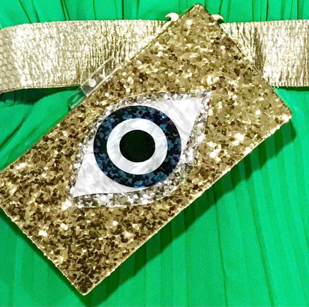 Gold eye clutch